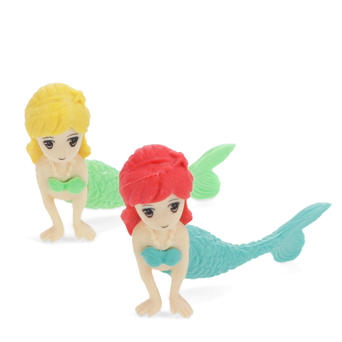 Two toy mermaids in a playful pose on a white background. One has red hair with a turquoise tail, and the other has yellow hair with a green tail.