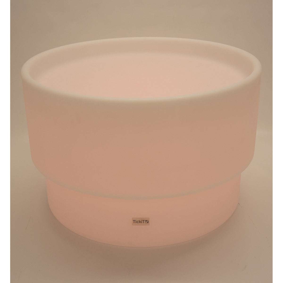 An illuminated LED table with a deep circular well, designed for sensory play, color exploration, and interactive learning activities.