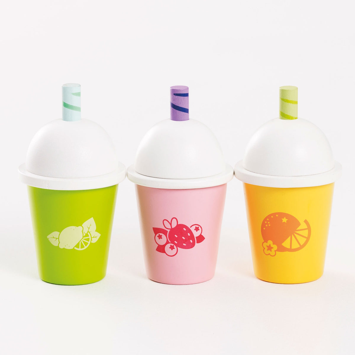 Three colorful wooden play smoothie cups lined up side-by-side on a white surface.