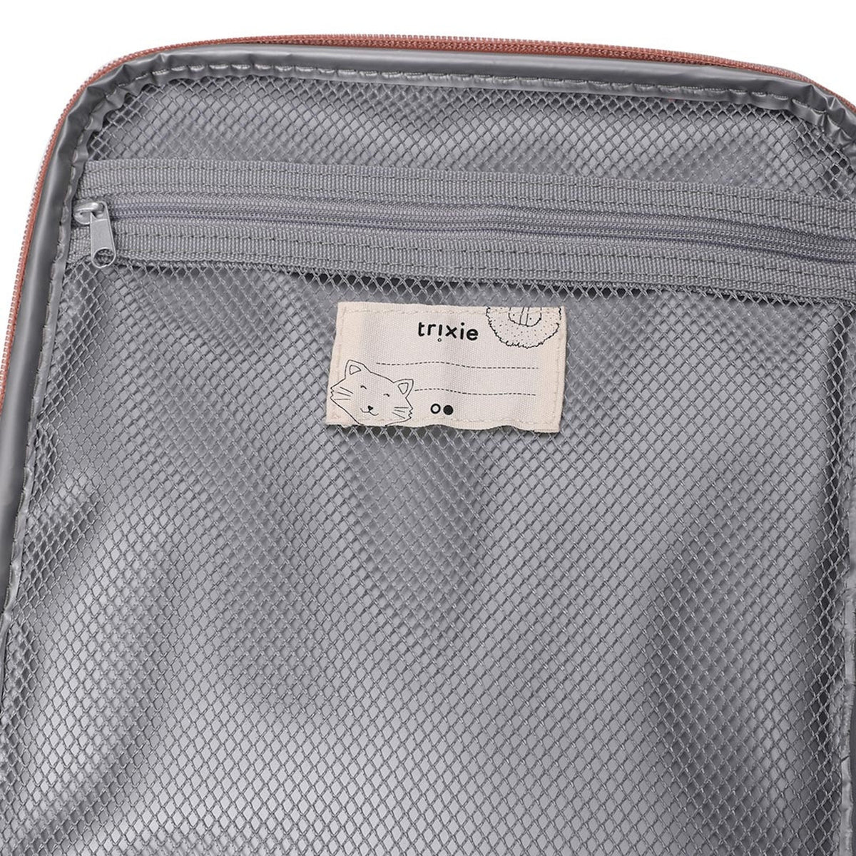 Inside of an open lunch bag showing a grey mesh zipper pocket and a Trixie name tag with a cat illustration.
