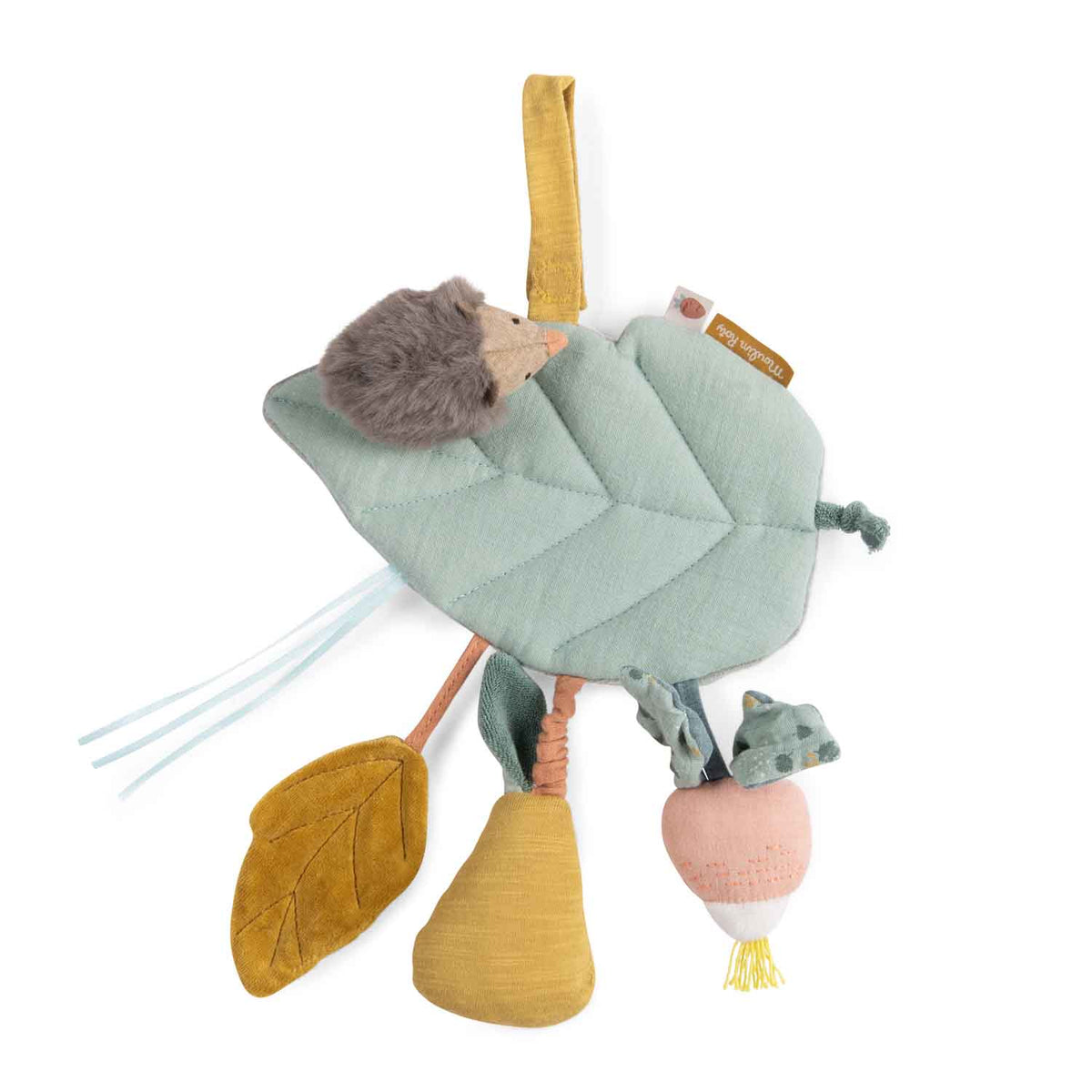 Fabric baby toy featuring a large green leaf with an attached plush hedgehog, dangling radish, pear, and small leaf.