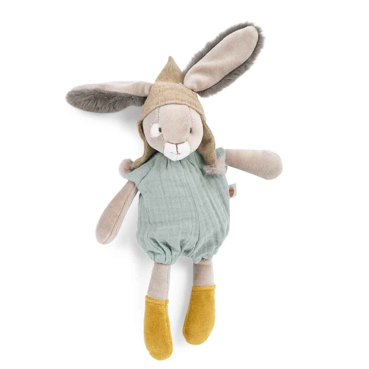 Plush rabbit toy wearing a tan pointed hood, a sage green romper, and yellow socks against a white background.