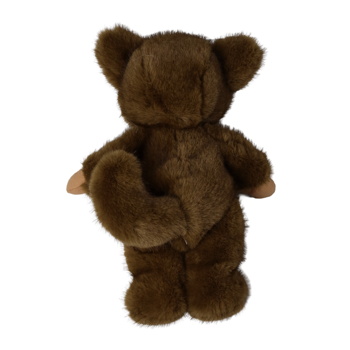 Back view of a plush doll in a fuzzy brown werewolf suit showing its tail and bear ears.