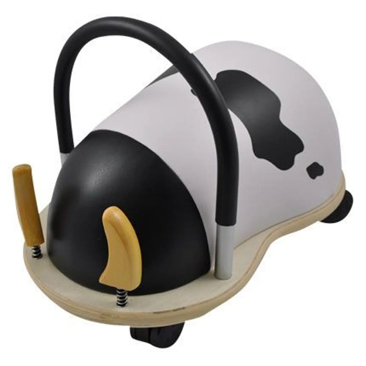 Side-profile view of the cow Wheely Bug ride-on toy, showing its curved black handle, black-and-white patterned body, and spring-mounted wooden horns.