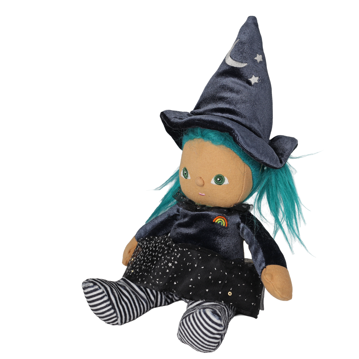 Seated plush witch doll with teal hair, pointed hat, and striped legs angled toward the left.