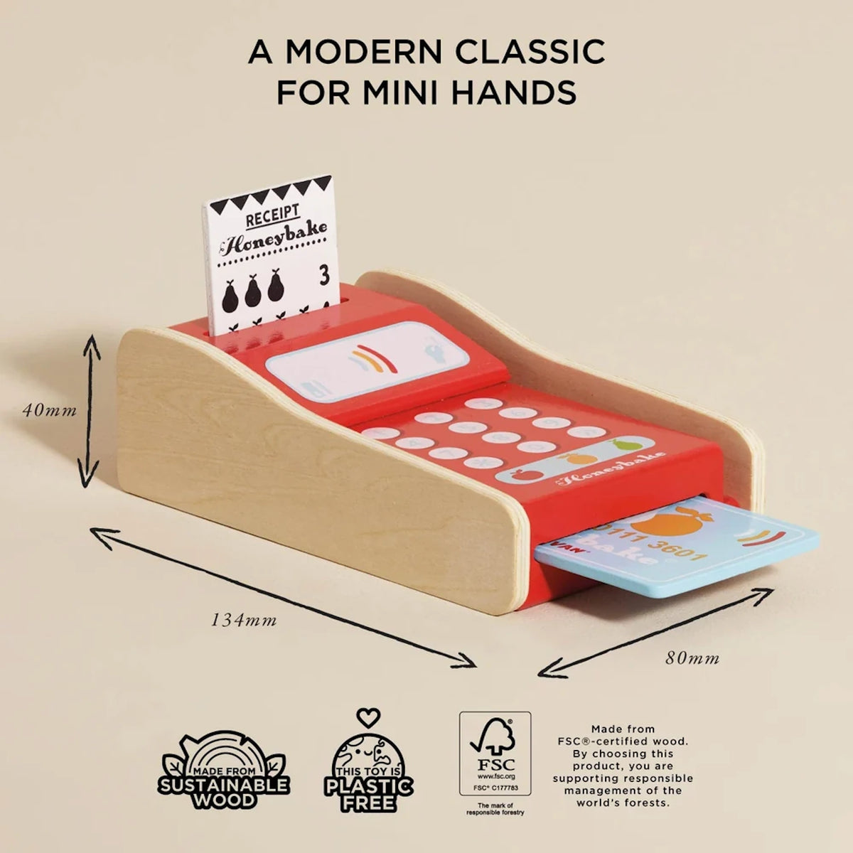 Wooden toy card machine with dimensions (40mm, 134mm, 80mm) and FSC certification labels.