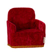 A charming Maileg folding chair in a bold red colour, shown from the side. Perfectly sized for Maileg mice and miniature settings.