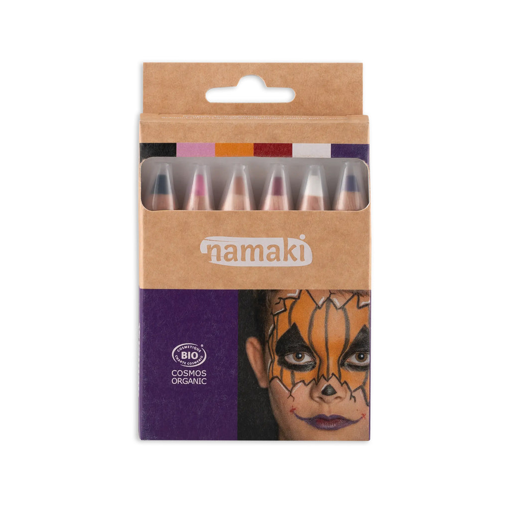  Namaki Worlds of Horrors face painting pencil set in packaging, featuring a child with a pumpkin-inspired face paint design.