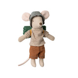 Maileg Big Brother Hiker Mouse wearing a thin-striped shirt, brown shorts, and a checked hat while carrying a green rolled sleeping bag