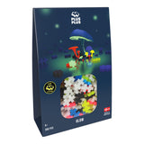  Packaging for the Plus-Plus Glow Mix set featuring a whimsical glowing mushroom scene.