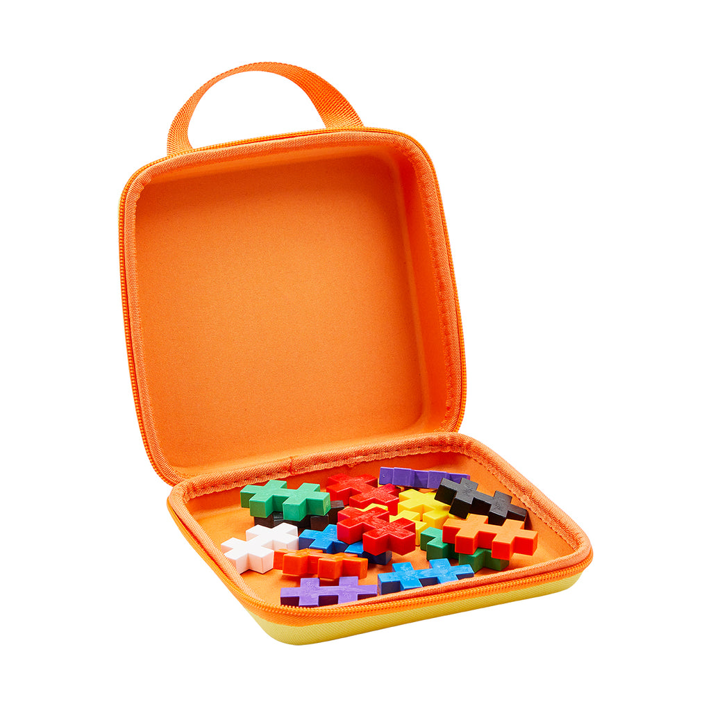 A compact Plus-Plus case with colourful puzzle pieces neatly stored inside
