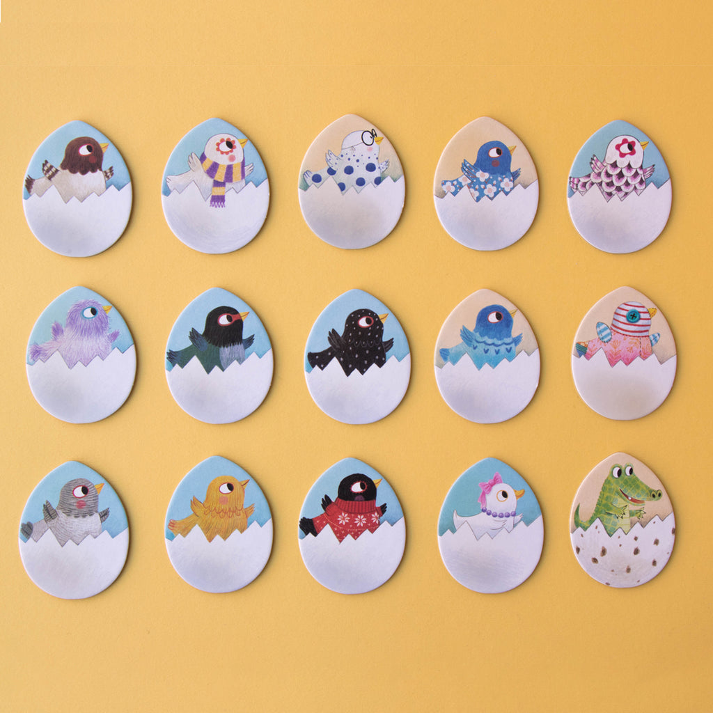A selection of adorable chick illustrations hatching from eggs, arranged on a yellow background.