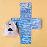 Chicks & Chickens memory game laid out with a drawstring storage bag and patterned game board.