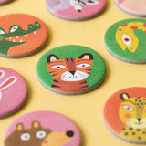 Tiger token from Lotto Habitats game – A round token featuring a cute tiger illustration on a bright green background.