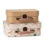 "Stacked Maileg unicorn suitcase set with floral and fantasy designs, perfect for UK children."