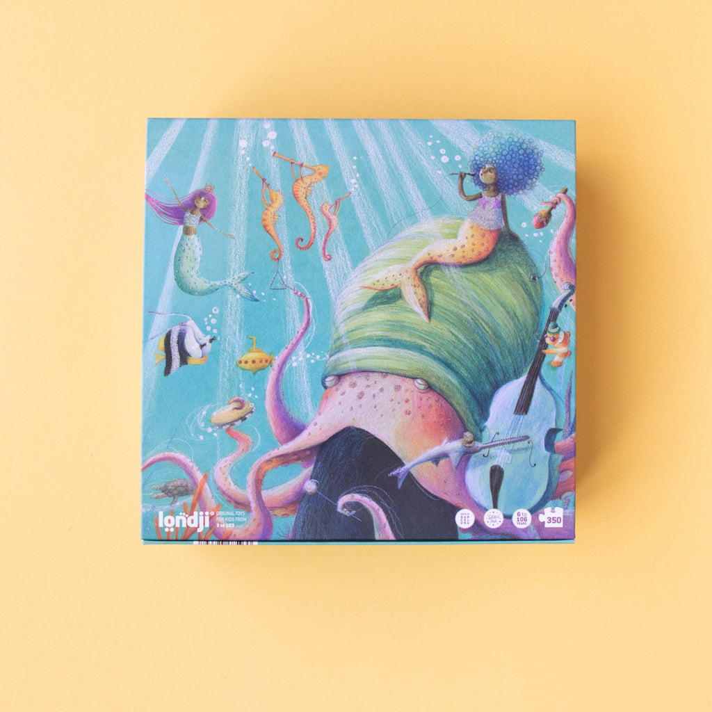 The back of the Londji My Mermaid puzzle box, featuring a vibrant illustration of an underwater world.