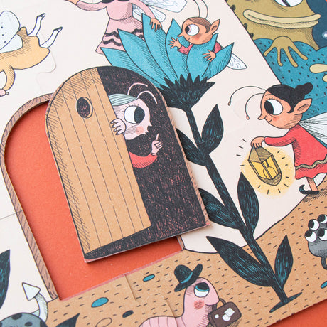 Elf peeking out from behind a wooden door in the puzzle