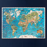 The fully assembled Animal Planet puzzle displaying a world map with animals.