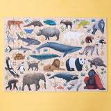 Completed "LIFE" puzzle displaying various endangered species like pandas, tigers, and whales.