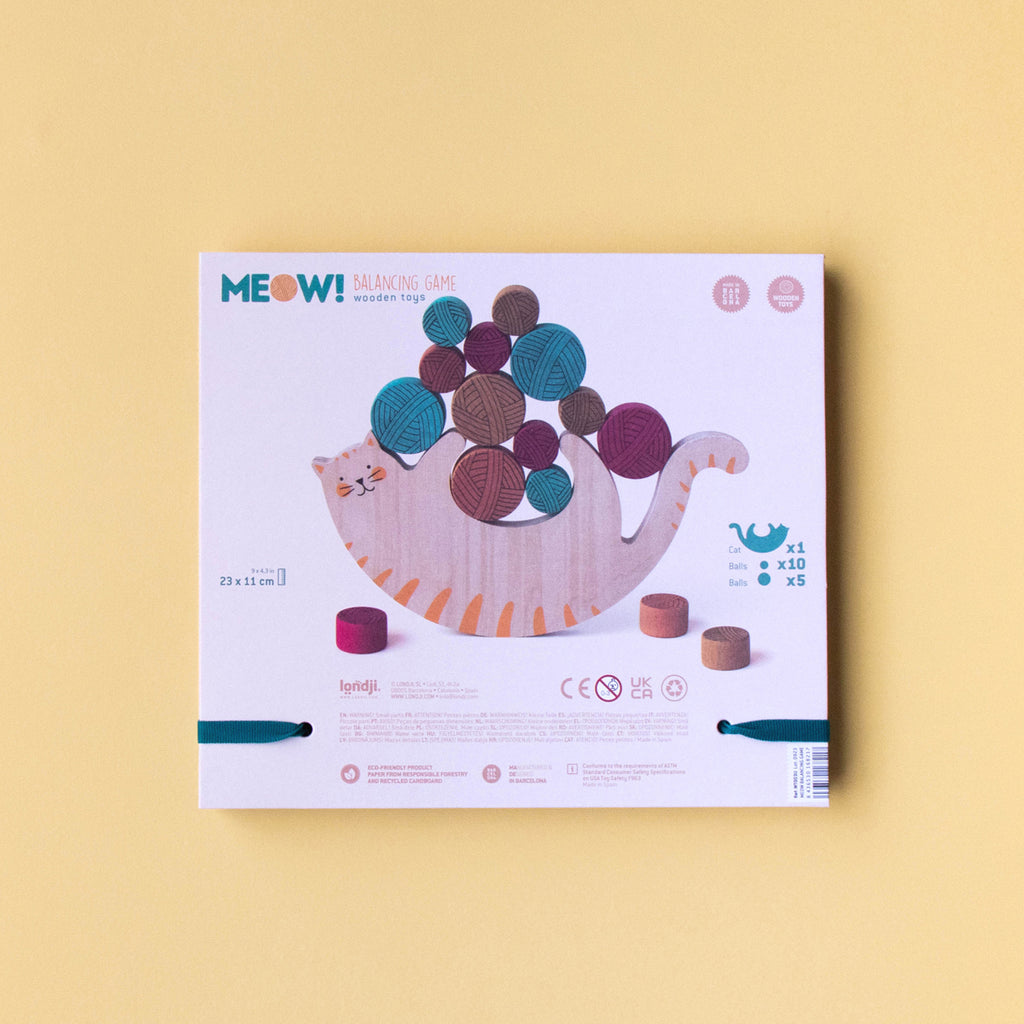 Back of the Meow! game box showing the balance challenge with yarn balls