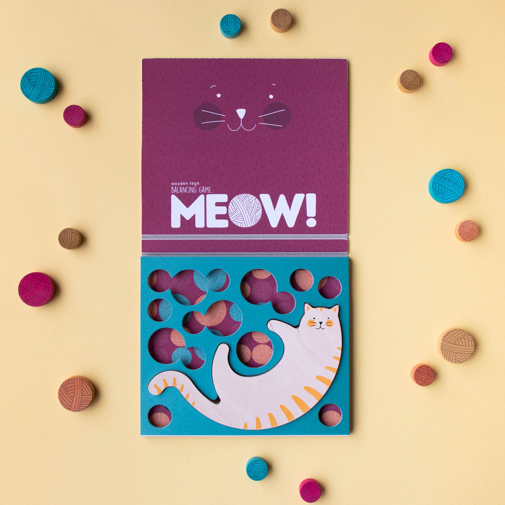 Unboxing the Londji Meow! game with colourful wooden yarn pieces