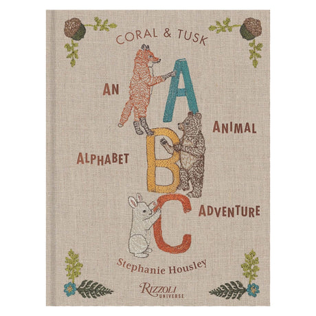 Coral & Tusk book cover with embroidered animals posing beside giant letters A, B, and C on linen cloth.