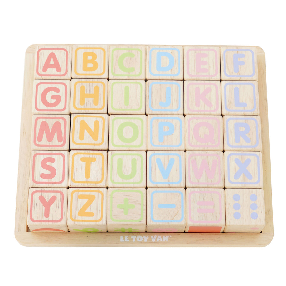 Wooden alphabet blocks set with pastel letters and math symbols displayed on a wooden tray.