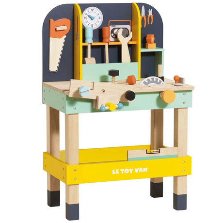 Colorful wooden toy workbench with tools and accessories, including a saw, clock, and screws, featuring a playful and educational design.