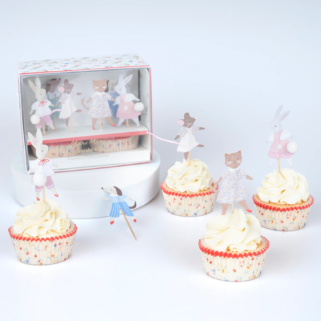Packaged Meri Meri Animal Friends Cupcake Kit displayed alongside frosted cupcakes topped with the illustrated animal picks.