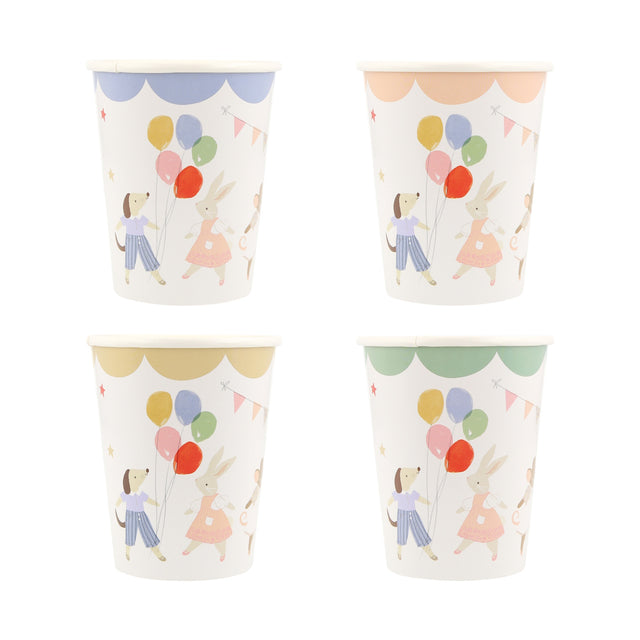Four paper party cups with illustrations of a dog, a rabbit, and balloons in pastel colors.