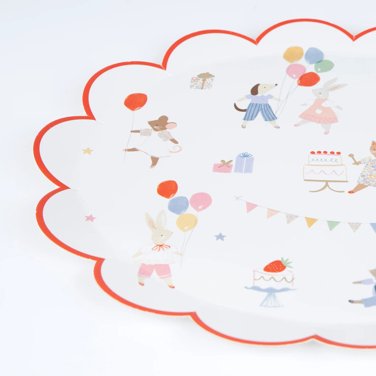 Scalloped paper plate with red trim, featuring illustrations of party animals, balloons, and cake.