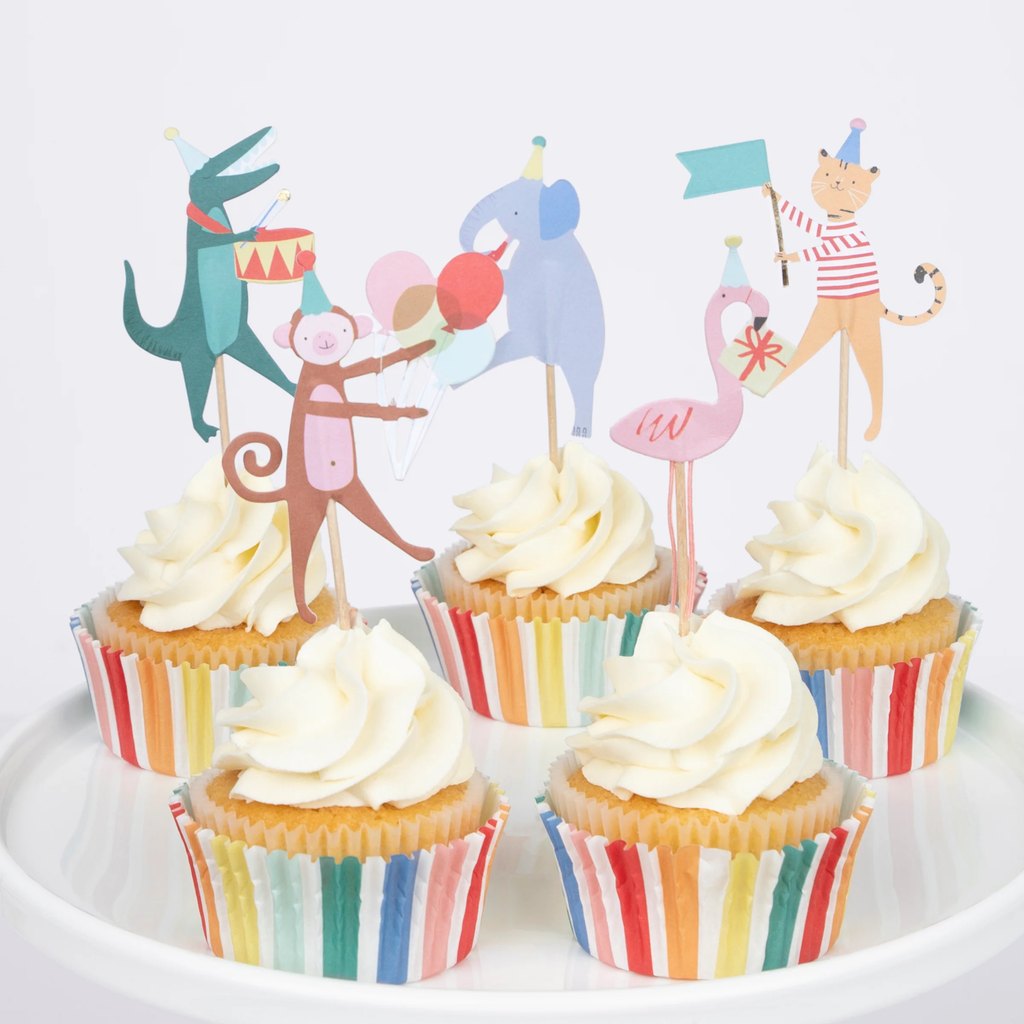 A set of cupcake decorations featuring animal-themed toppers and colorful wrappers, perfect for adding a fun touch to animal-themed parties.