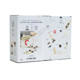 Back of packaging for Le Toy Van 10-piece wooden vet set showing piece contents and bag dimensions.