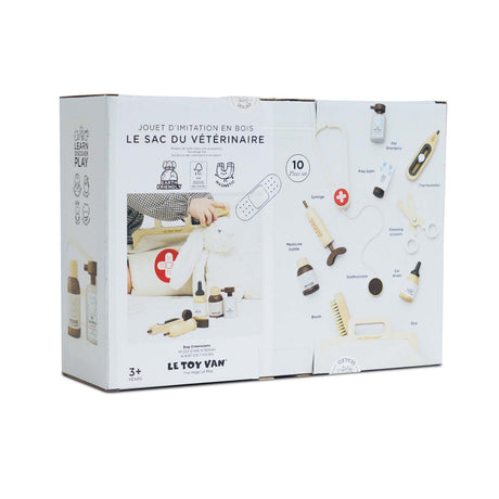 Back of packaging for Le Toy Van 10-piece wooden vet set showing piece contents and bag dimensions.