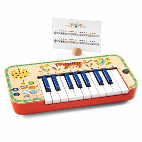 Djeco Animambo electronic synthesizer wooden toy keyboard for kids with sheet music.