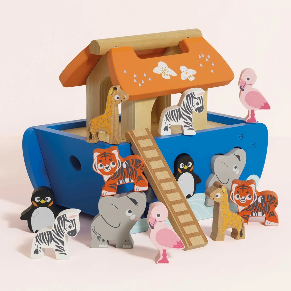 Wooden Noah's Ark shape sorter toy with colorful animal blocks around it.