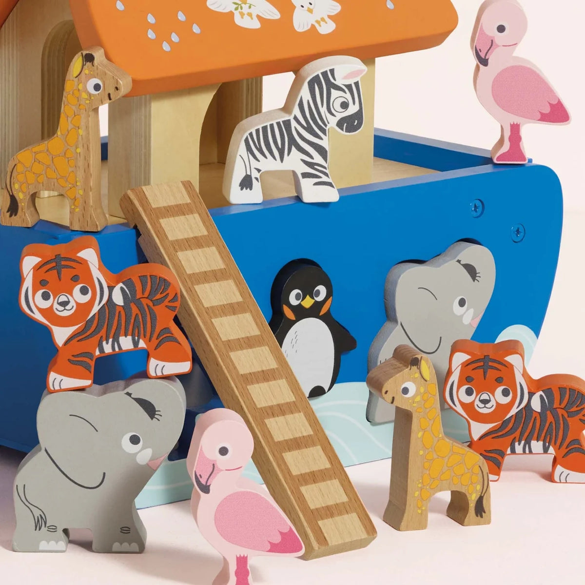 Wooden Noah's Ark shape sorter toy featuring a ladder, orange roof, and animal blocks.