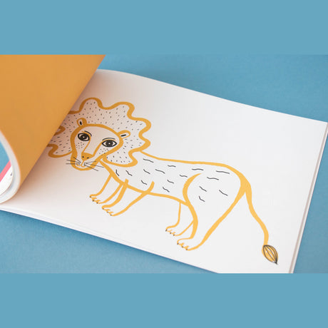 Minimalist line drawing of a yellow lion in a Londji art activity book on a blue background.