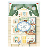 Book cover for "At Home in a Book" by Lauren O'Hara, featuring a dollhouse-style illustration of classic story characters.