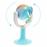 Spinning suction cup high chair toy with colorful rattle beads and teal base for infant sensory play.