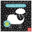"Baby's First Cloth Book: Cuddly Sheep" cover featuring a black-and-white sheep on a pattern background.