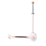 A charming retro-style kids' scooter in pastel pink, featuring three wheels for balance and adjustable handlebar.