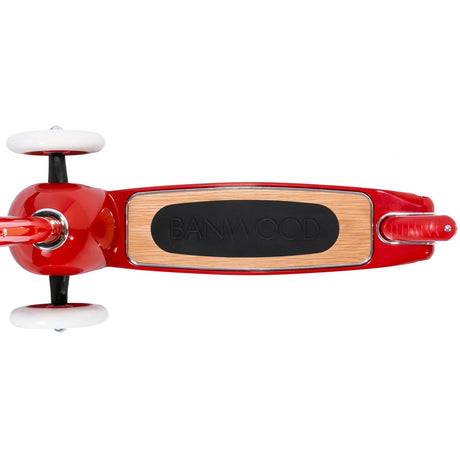 Top-down view of the base, wheels, deck, and fender brake of a red Banwood kick scooter.