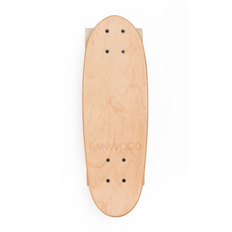 A minimalist cruiser skateboard with a natural wood finish, soft wheels, and a classic design, perfect for young riders and smooth cruising.