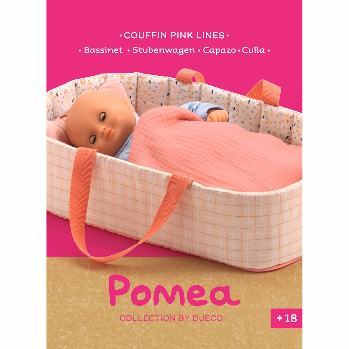 Djeco Pomea Collection Pink Lines Doll Bassinet with baby doll tucked under a peach blanket.