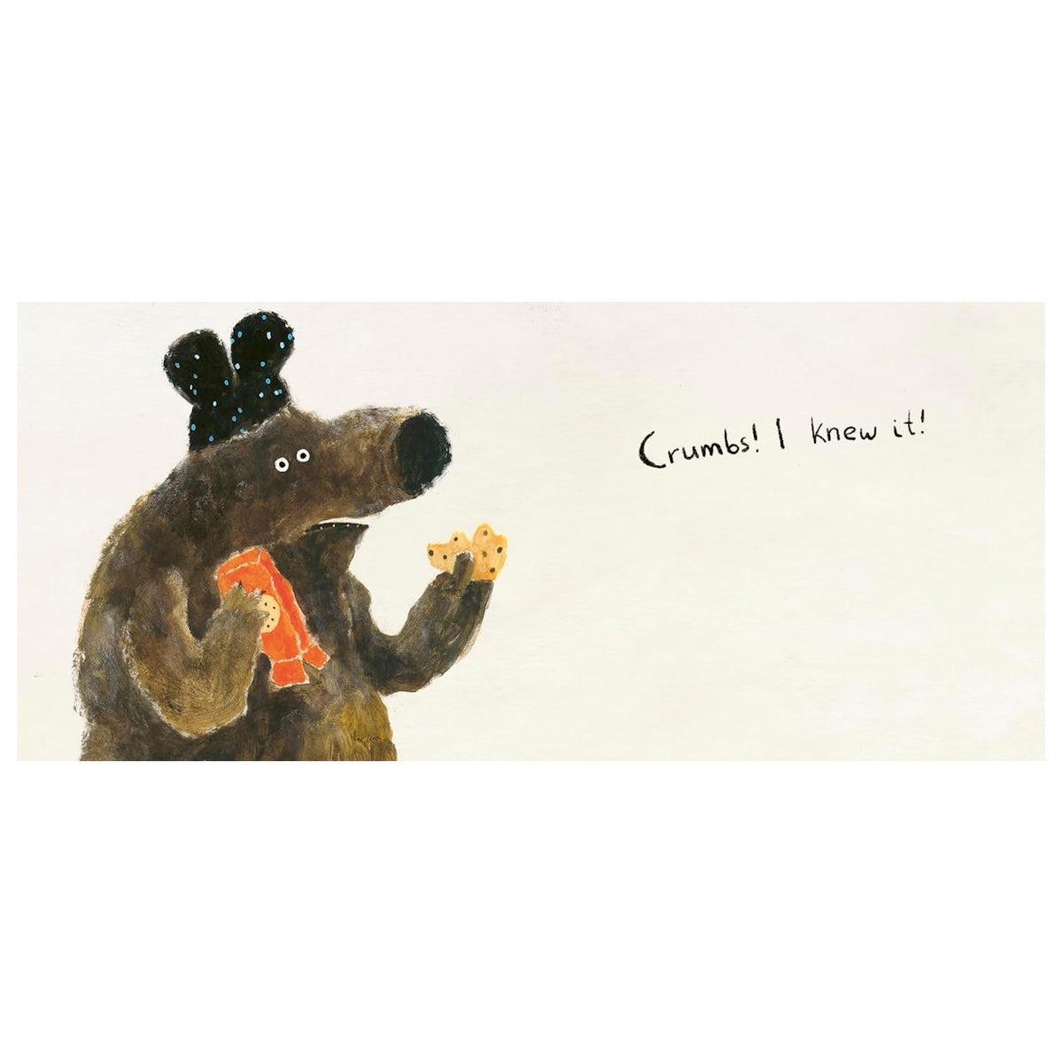 Children's book page showing an illustrated brown bear holding a cookie with text that reads "Crumbs! I knew it!"