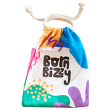 Colorful drawstring canvas bag with abstract shapes and the words "Born Bizzy" printed on the front.