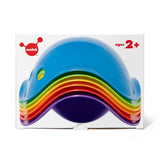 A stack of six colorful, shell-shaped Moluk Bilibo Mini toys in rainbow colors for creative, open-ended toddler play.