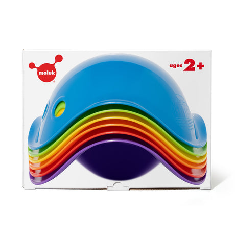A stack of six colorful, shell-shaped Moluk Bilibo Mini toys in rainbow colors for creative, open-ended toddler play.