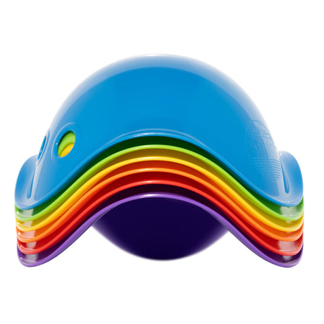 Stack of six colorful Bilibo Midi shell toys in rainbow colors, perfect for open-ended play and motor skill development.